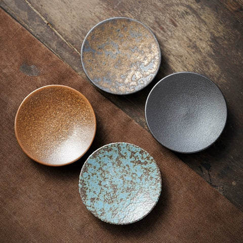 Ceramic small dish with speckles