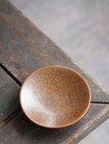 Ceramic small dish with speckles